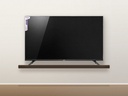 iLux Smart TV 65 pouces - installe sur meuble mural